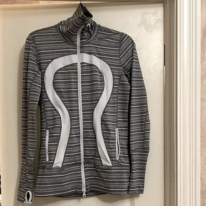 Lululemon white and grey size 6 double zip jacket with thumb holes.